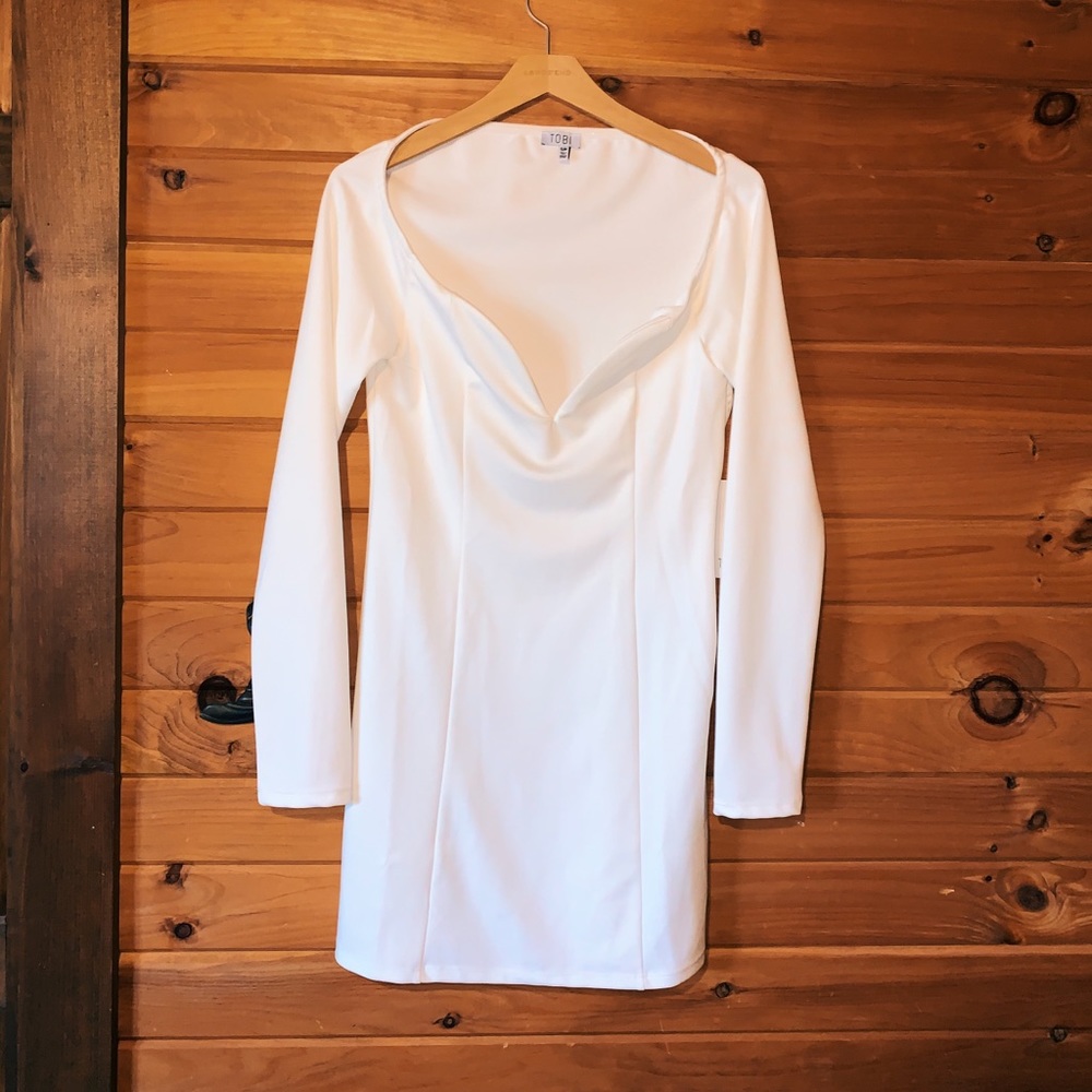 White plunge line dress